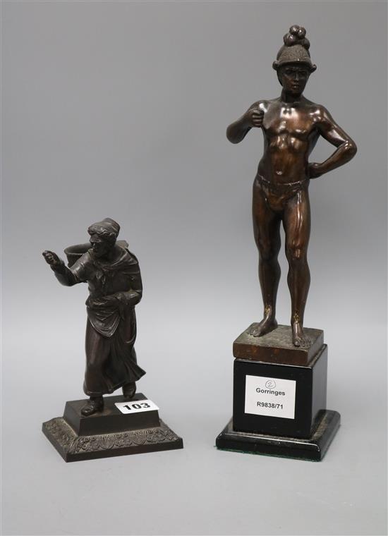 A bronze gladiator and match holder Tallest 33cm